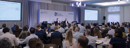 audience watching panelists new home trends summit